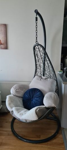 egg chair, original outdoor grey cushion. Including extra cushions & throw. Used indoors. Will include large and small cushion and fake throw