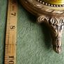 Vintage barometer with silvered dial mounted in an ornate gilt frame. Image 7