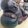 A large wooden statue of a sleeping Buddha Image 3