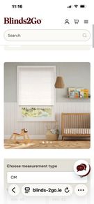 Pair of Cream Roman blinds