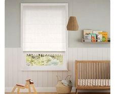 Pair of Cream Roman blinds