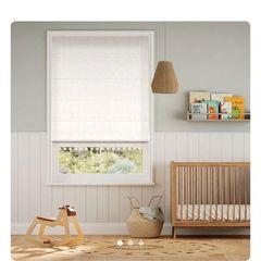 Pair of Cream Roman blinds