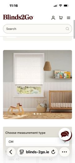 Pair of Cream Roman blinds