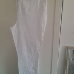 ladies white chino trousers .