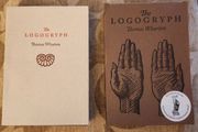 The Logogryph. By Thomas Wharton. First Edition Complete With Presentation Sleeve Paperback In Very Good Condition. 37