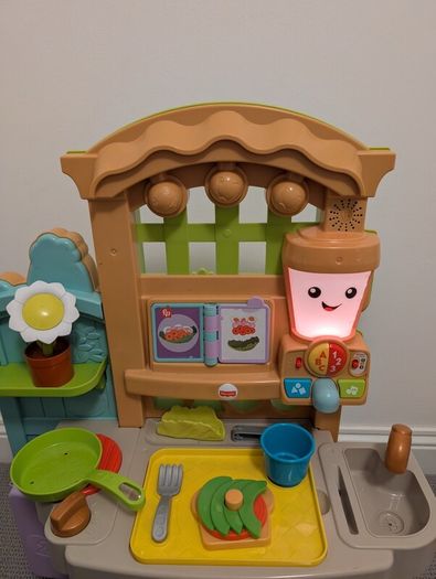Fisher-Price Laugh & Learn Grow-the-Fun Garden to Kitchen