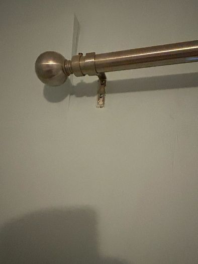 Silver curtain pole