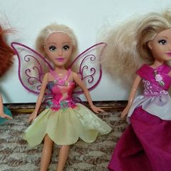 3 dolls with clothes