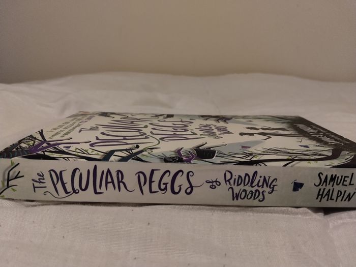 The peculiar peggs of Riddling Woods by Samuel J. Halpin