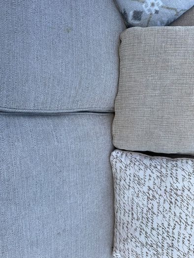 Beige L shaped corner sofa