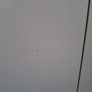 Timer and white wardrobe and bedside locker Image 6