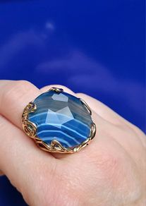 Adjustable ring with faceted blue Agate stone & gold plated setting
