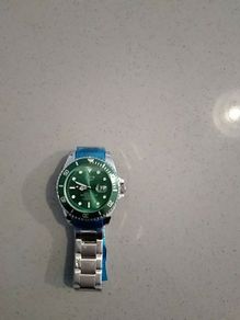 Lige submariner watch green face
