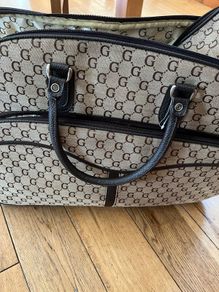 wheeled suitcase bag with long handle and short carry handles