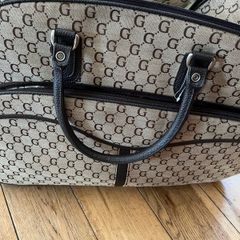 wheeled suitcase bag with long handle and short carry handles