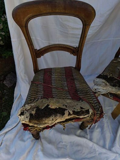 pair of Victorian dining chairs needing restoration