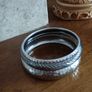 Beautiful bracelets in silver tone. Image 3