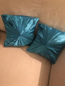 Teal satin cushions