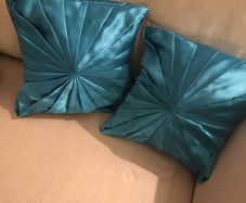 Teal satin cushions