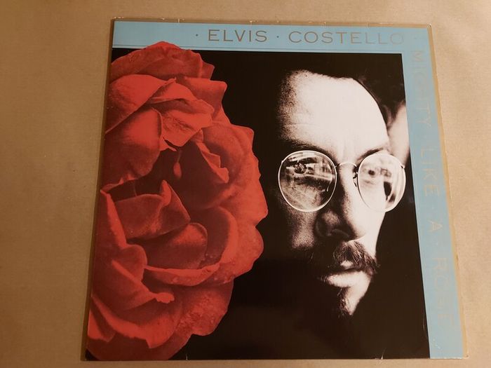 Elvis Costello - Mighty Like A Rose - Vinyl Record + Hundreds More
