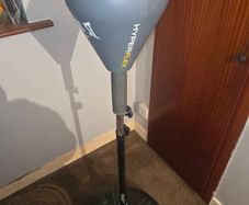 Punching bag stand with gloves