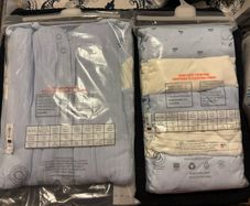 baby sleepsuits and vests