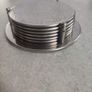 Set of 7 Vintage Silver Plate Coasters w/Matching Holder & "Patent" Leather Base Image 2