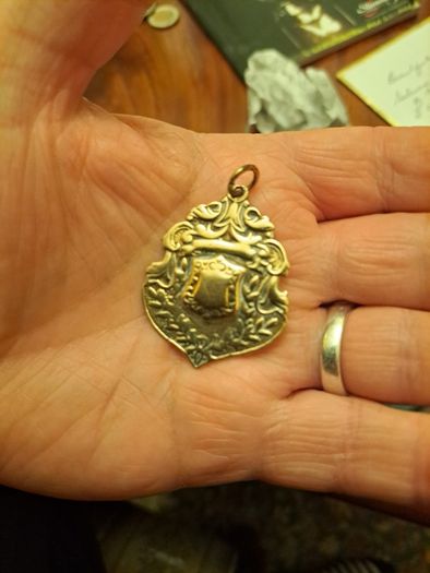 Gold  plated Antique medal re listed