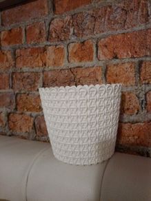 white woven basket effect plant pot