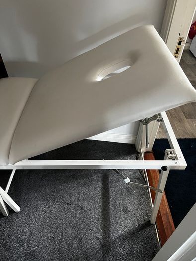 Massage table