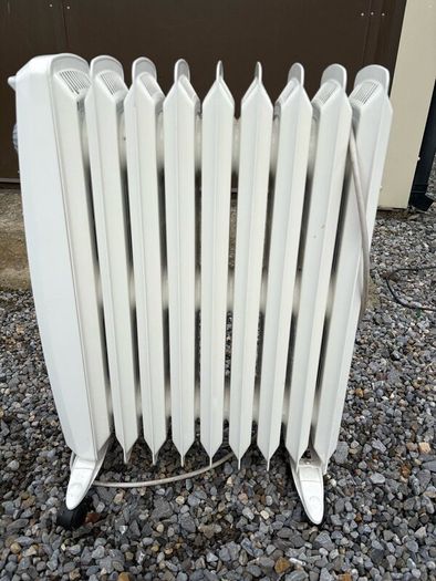 Beko fridge freezer and plug in room heater
