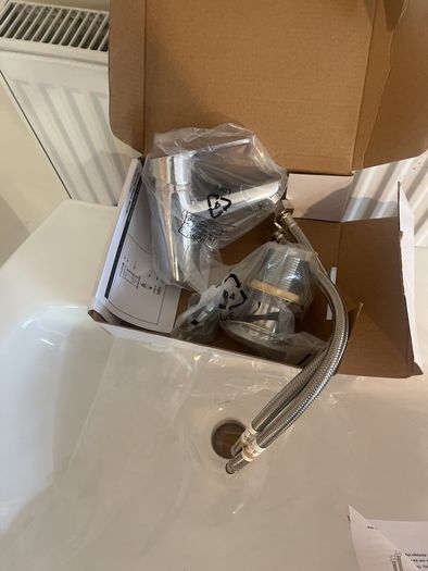 bathroom sink , pedestal and tap