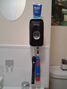 Automatic Toothpaste Squeezer and toothbrush holder