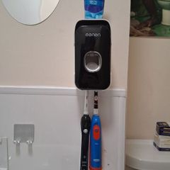 Automatic Toothpaste Squeezer and toothbrush holder