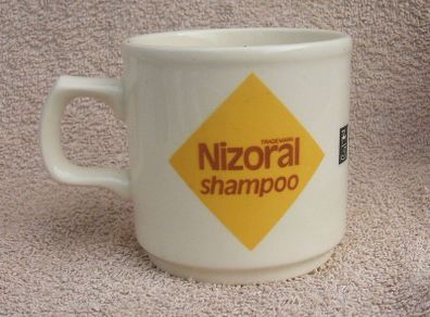 NIZORAL SHAMPOO (Janssen) - a scarce promotional mug made by Carrigdhoun Co-Op pottery of Carrigaline, County Cork (late 1980s)
