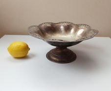 Vintage silver plated footed candy dish with repousse decoration