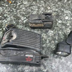 Atlas Copco charger and battery