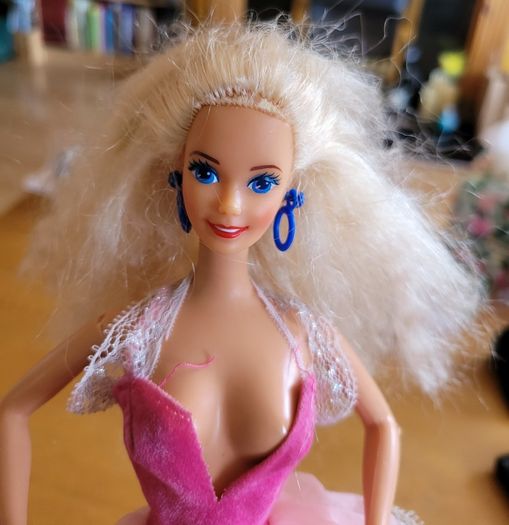 Vintage Barbie with blond hair and princess dress