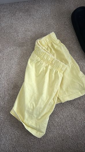 Yellow Zara shorts with free sliders
