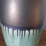 Green and bronze coloured ceramic vase Image 3