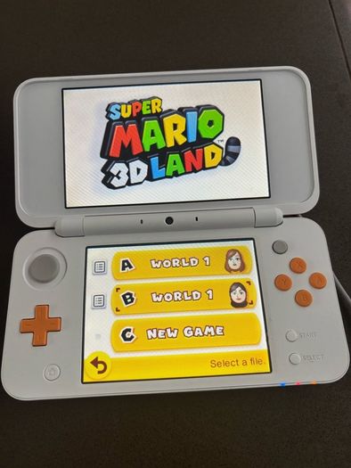 Nintendo New 2DS XL White & Orange + 17 Games & Carry Case