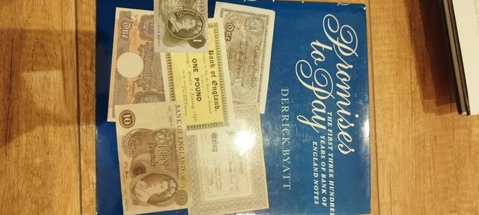 Coin and note book