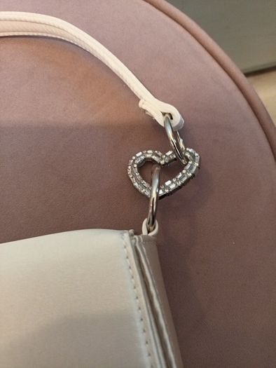 Brand new satin cream occassion bag