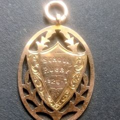 Antique 9ct rose gold school rugby shield pendant