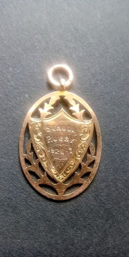 Antique 9ct rose gold school rugby shield pendant
