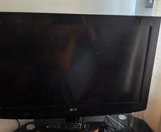 LG 32 inch Flat Screen TV plus Technika DVD Player.