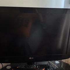 LG 32 inch Flat Screen TV with Stand plus DVD Player.