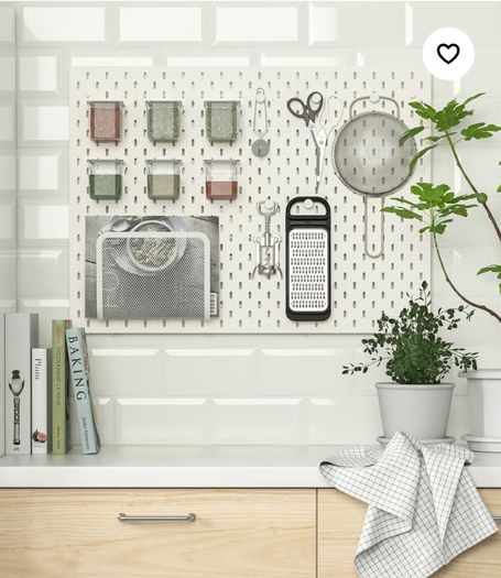 Ikea pegboard including wall attachments and accessories