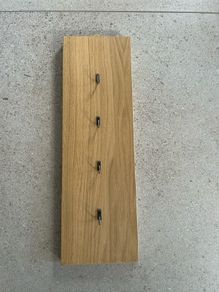 Wall hooks on solid oak panel