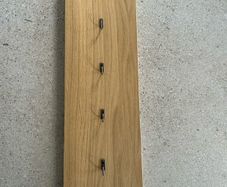 Wall hooks on solid oak panel